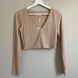 Brand new; Long sleeve, nude sparkly crop top, V neck, double lined